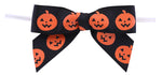 Load image into Gallery viewer, Grosgrain Jack-O-Lantern Twist Tie Bows -- 7/8 in --- 100 Pieces p/pack, Black & Orange