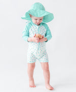 Load image into Gallery viewer, Boys' Long Sleeve One Piece Rash Guard --- UPF 50+ Sun Protection --- Whimsical Charm Design by RuggedButts®