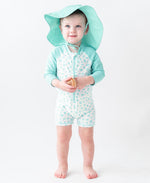 Load image into Gallery viewer, Boys' Long Sleeve One Piece Rash Guard --- UPF 50+ Sun Protection --- Whimsical Charm Design by RuggedButts®