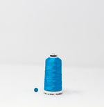 Load image into Gallery viewer, Larimar Blue Color, Classic Rayon Machine Embroidery Thread, (#40 / #60 Weights, Ref. 1095), Various Sizes by MADEIRA