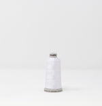 Load image into Gallery viewer, Bright White Color, Polyneon Machine Embroidery Thread, (#40 / #60 Weights, Ref. 1801), Various Sizes by MADEIRA®