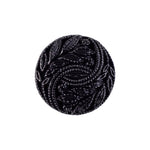 Load image into Gallery viewer, A close-up look at a large 27mm black Fern Nylon coat button, featuring a deep monochromatic relief of the swirling botanical fern design with a glossy finish.
