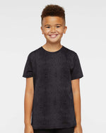 Load image into Gallery viewer, Front view of a smiling young boy wearing the Black Reptile Youth Fine Jersey T-Shirt, showcasing the relaxed standard fit and crew neck styling.
