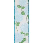 Load image into Gallery viewer, Reverse side of blue hydrangea bright linen wired edge ribbon showing softer pastel blue floral hydrangea pattern with green leaves on a white linen-textured background, finished with turquoise wired edges for versatile decorative use.
