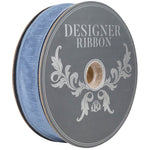 Load image into Gallery viewer, Side view of a large 50-yard roll of Florist Basics Dupioni Supreme Wired Edge Ribbon in French Blue featuring a vibrant faux silk finish and flexible wired edges for commercial decorating and event design.
