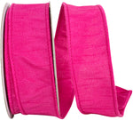 Load image into Gallery viewer, A partial, loose curl of the 1.5-inch wide Dupioni Supreme Wired Edge Ribbon, highlighting its solid vibrant fuchsia color, slubbed fabric texture, and a matching stitched wire edge
