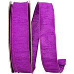 Load image into Gallery viewer, Large 50-yard roll of Florist Basics Dupioni Supreme Wired Edge Ribbon in Plum featuring a vibrant faux silk finish and flexible wired edges for commercial decorating and event design.
