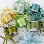 Load image into Gallery viewer, 1/8&quot;  Silk Ribbon, 7 Spool Collection (Lime Green, Yellow Green, Seafom Green, Avocado, Teal, Light Teal &amp; Sage Green), 10 Yards each
