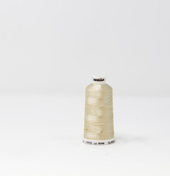 910-1072 5,500 yard cone of #40 weight Coconut Cream Rayon machine  embroidery thread.